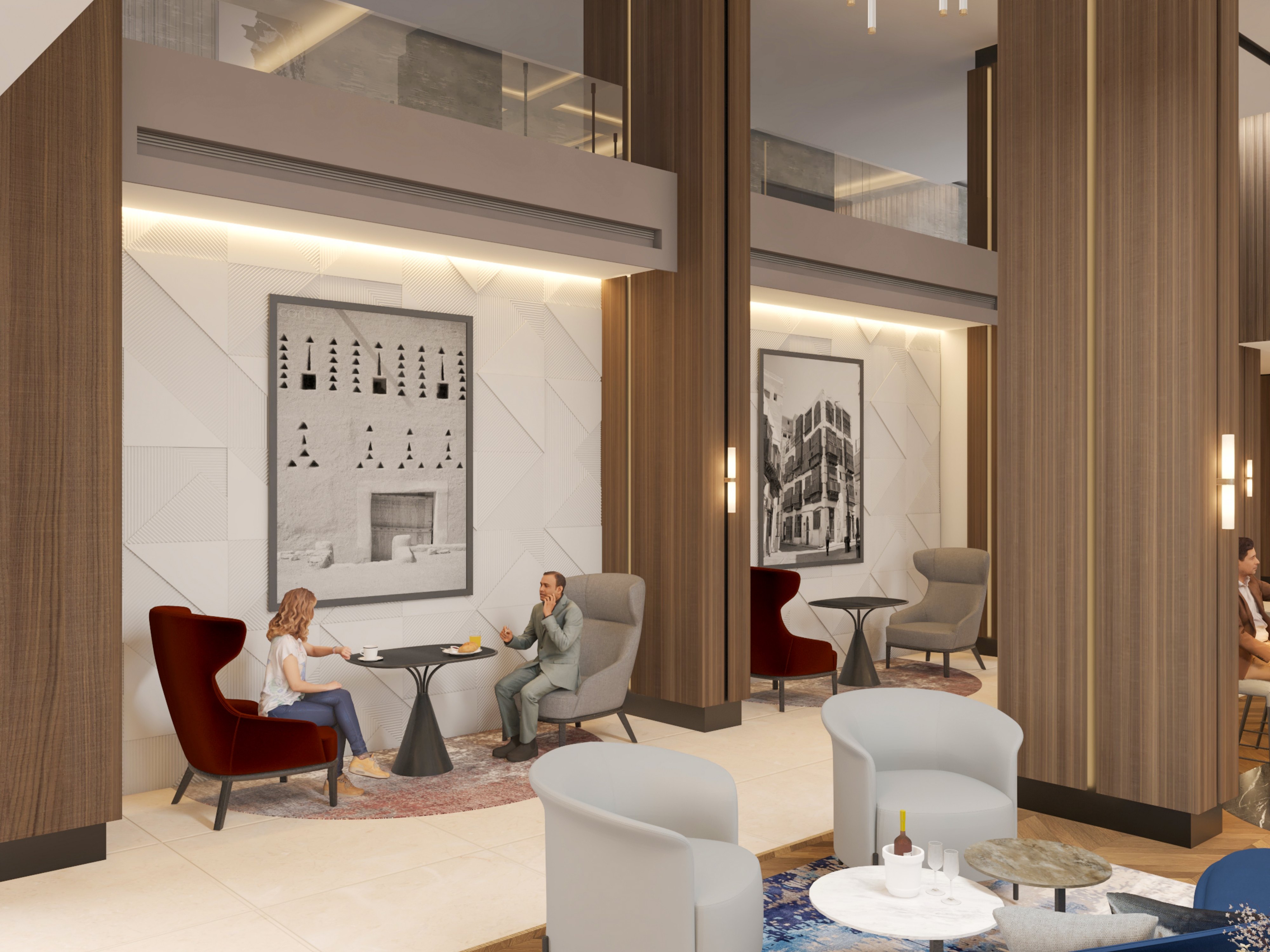 Hospitality lounge seating niche with warm timber columns, soft chairs, wall art, and layered lighting.